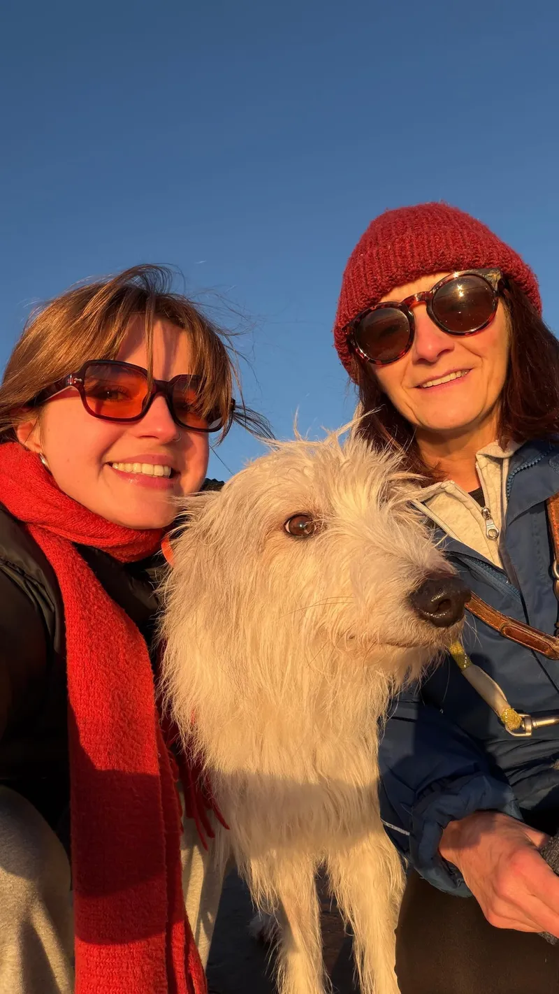 Rose and her mum with Scout the dog at golden hour